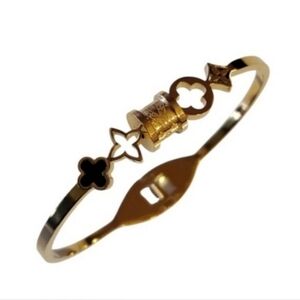 Unique Stainless Steel Bracelet with Quatrefoil Accents